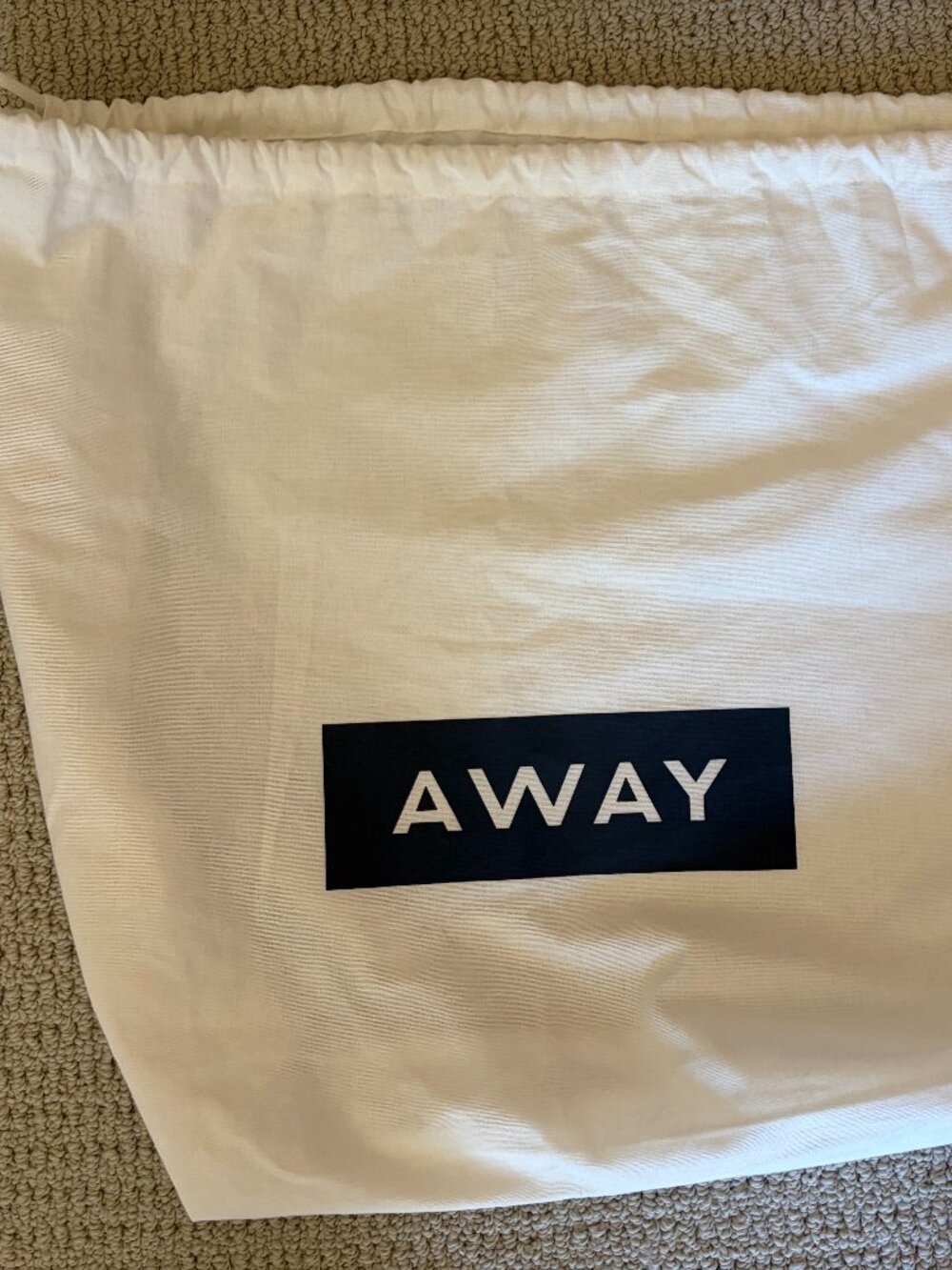 New AWAY carry on luggage dust bag/laundry
